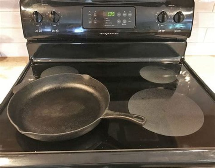 Can an Iron Skillet be used on a glass cooktop?