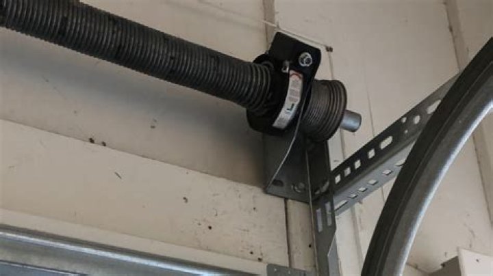 How can I lift my garage door without a spring?