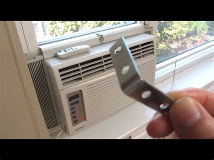 How do I secure my window air conditioner?