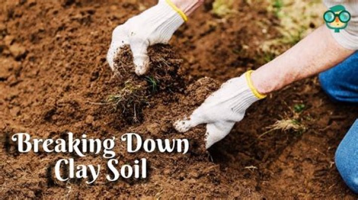 How do you break down hard soil?