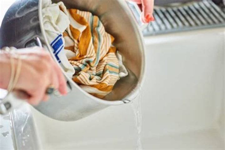 How do you clean smelly dishcloths?