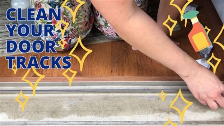 How do you clean the track of a sliding glass door?