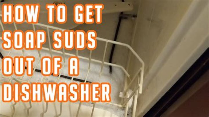 How do you get soap residue out of a dishwasher?