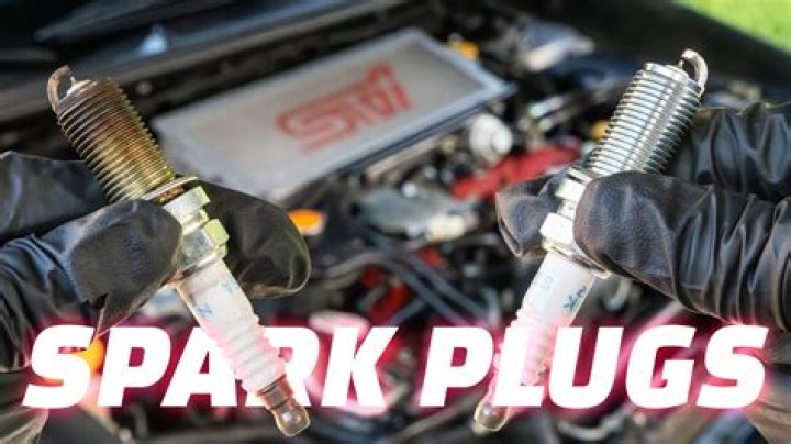 How do you get spark plugs out?
