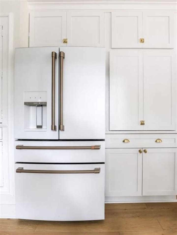 How do you remove a built in refrigerator?