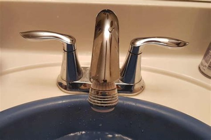 How do you remove a stubborn kitchen faucet?