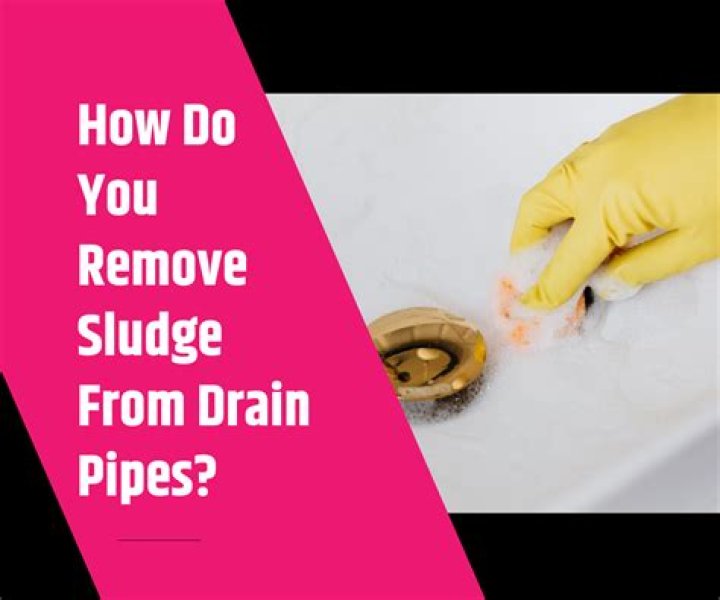 How do you remove sludge from sewer pipes?