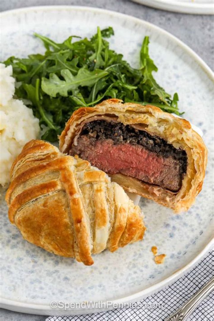 What is served with beef Wellington?