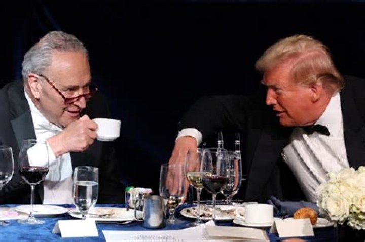 Who is the woman with Chuck Schumer?