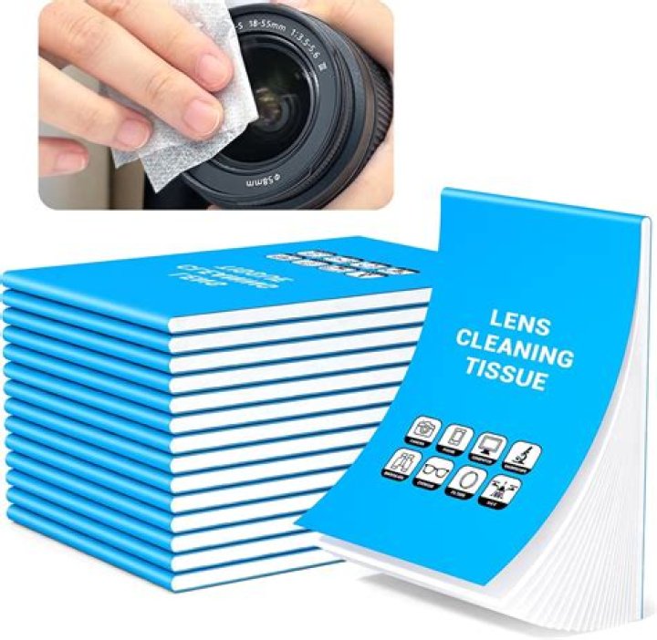 Why must you use lens paper to clean the objectives and not paper towel?